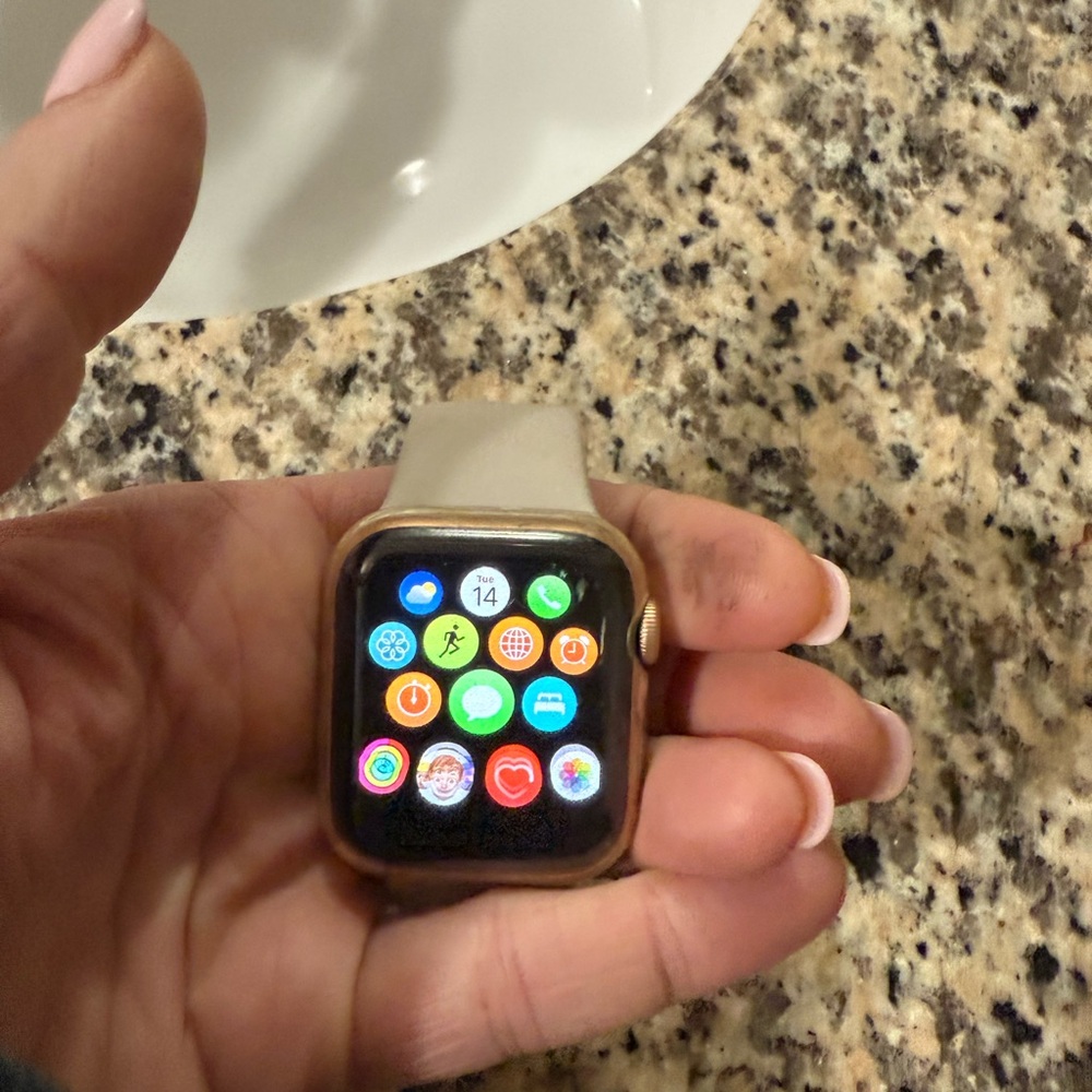 Apple Smartwatch with Gold Case and Cream Band